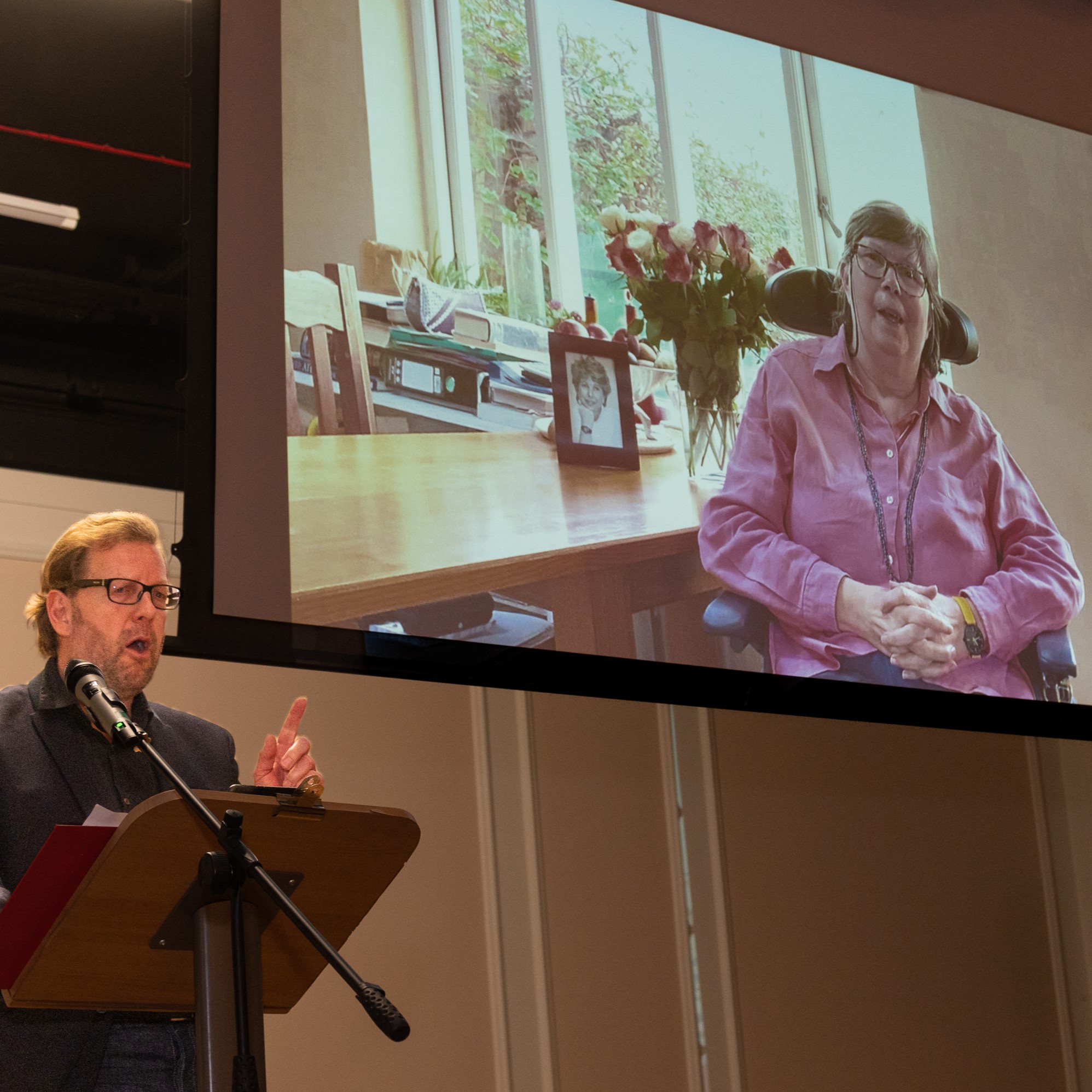 Ruils Community and Volunteer Manager, Gary Williams, celebrates volunteer Patty Lloyd
