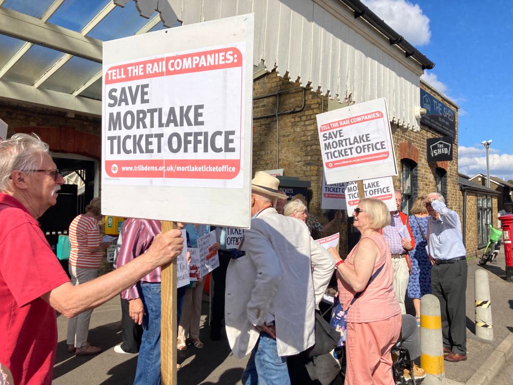 Group shot of protesters in front of Mortlake Station